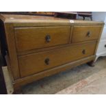 A 3' 5" early 20th Century stained oak dressing chest base of two short and one long drawer, set