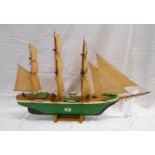 A 33" long scratch built model of a three masted clipper with solid wood hull
