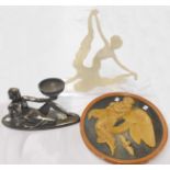 A plaster wall plaque with angel and owl decoration - sold with two resin Art Deco style figures (