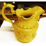 An antique silicone ware jug with anthropomorphic monkey decoration and mask spout - old stapled