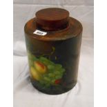 A hand painted wooden lidded cannister