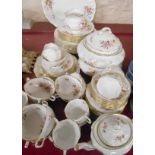 A Royal Crown Derby Posies pattern eight place tea and dinner service including tureens, teapot,