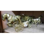 Two brass horses and carts