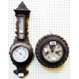 A carved oak banjo barometer/thermometer - sold with a 9" diameter Ansonia wall clock with carved