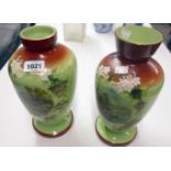 A pair of 11" late 19th Century lime green glass baluster vases with decorative enamel scene