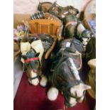 Four large ceramic heavy horses, all harnessed - one a/f and one with cart