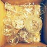 A box containing a quantity of glassware including cut glass bowl, lidded jars, sundae dishes, etc.