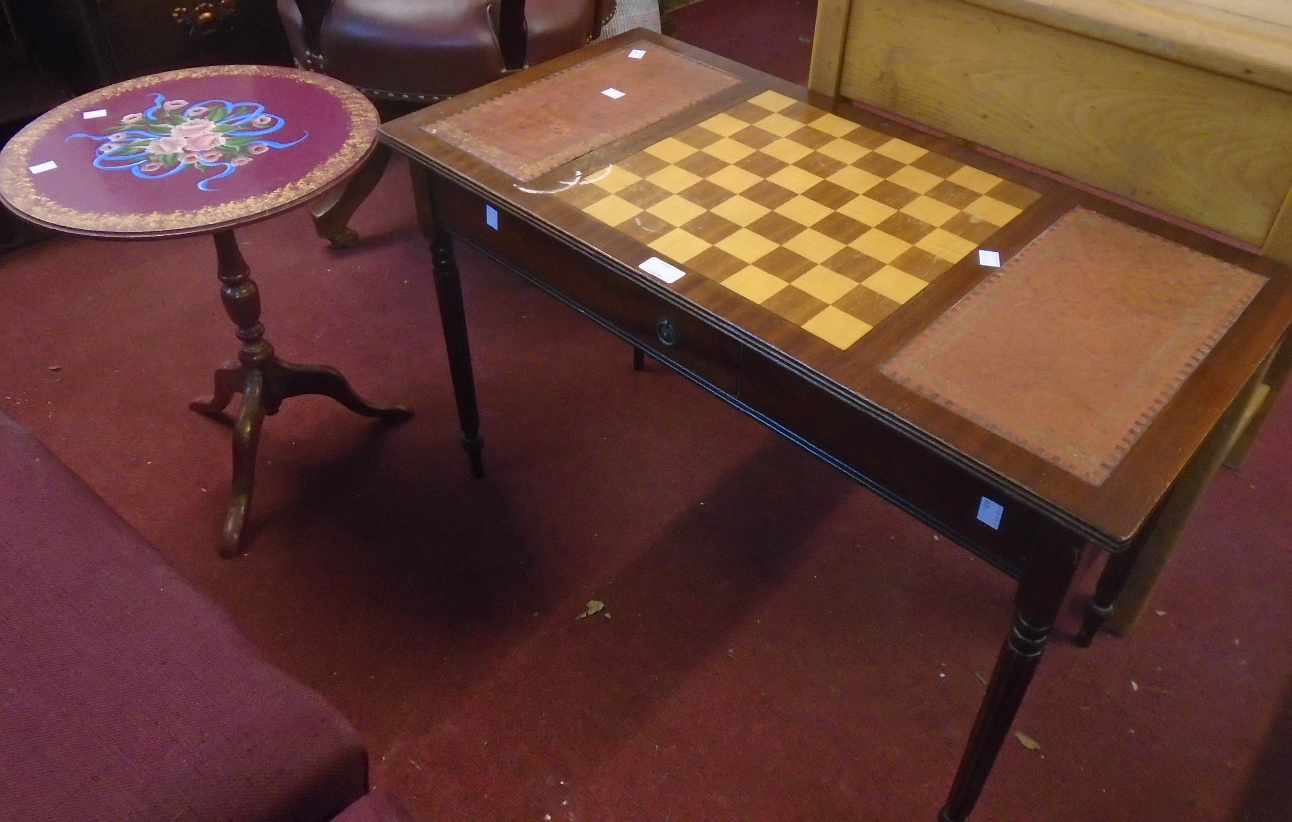 A 32" reproduction mahogany games table with flanking leather inset panels, single drawers and