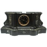 A late Victorian black slate and green marble cased pedestal mantel clock with black dial,