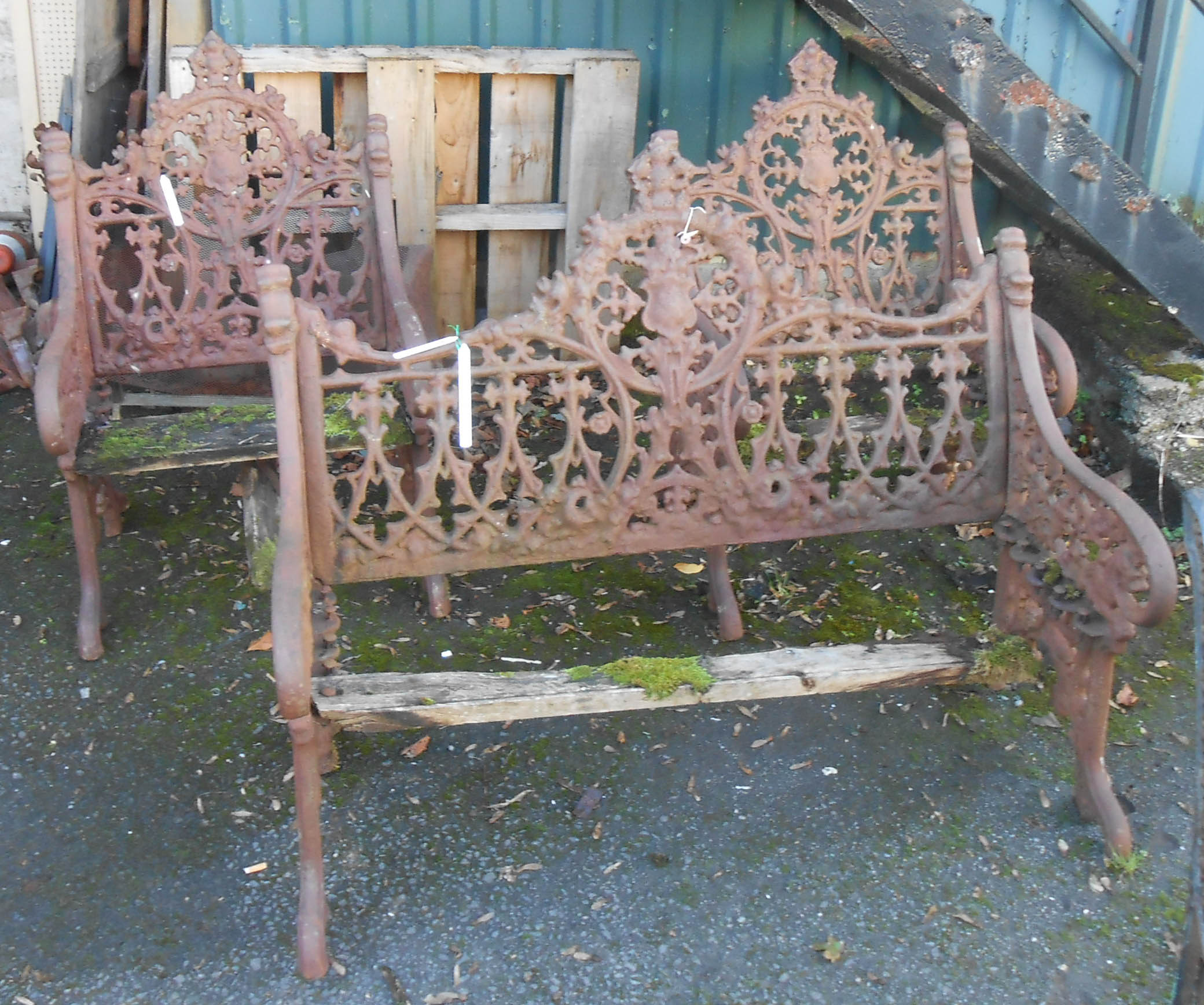 A 3' 10 1/2" 19th Century Coalbrookdale type Gothic pattern cast iron garden bench and pair of