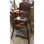 A late Victorian stained beech framed child's metamorphic highchair/play table with remains of