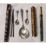 A Chinese trousse set of chopsticks and knife in mottled carrier, a modern set in bamboo pattern