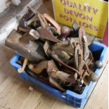 A crate containing various woodworking planes including box planes, Record, Bailey No. 4, Stanley