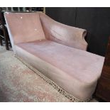A 5' 6" 20th Century day bed upholstered in old rose coloured draylon