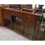 A 4' 11" 19th Century mahogany and strung kneehole sideboard with raised plinth back, central frieze