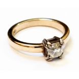 An 18ct. gold diamond solitaire ring - 0.77ct. - complete with valuation certificate