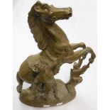 A 14" high spelter Marly horse and tamer