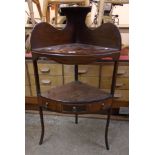 A 23" 19th Century mahogany and strung gentleman's corner washstand with three surfaces, shaped back