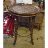 A 20" diameter eastern hardwood tray top table with mosaic blocks to top and flanking iron twist