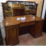 A 6' Victorian mahogany break bow front mirror back twin pedestal sideboard with moulded top and