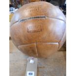 A vintage German leather medicine ball