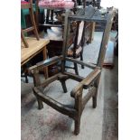 A 19th Century carved oak baronial carver chair frame