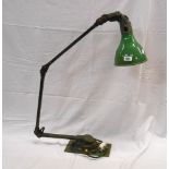 A 1930's-1940's Mek Elek Mekelite industrial wall mounted task light with three points of