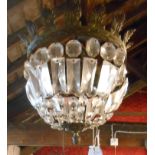 A gilt metal basket ceiling pendant light with faceted glass lustres