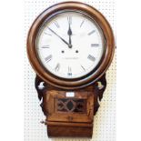 A late Victorian walnut cased drop dial wall clock with visible pendulum, brass bezel and 11 3/4"