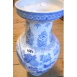 An 18 1/2" modern blue and white baluster vase