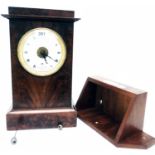 A 19th Century French Empire period mahogany cased bracket clock with strike repeat alarm