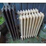 A pair of 31" high 1930's four column eight section radiators - sold with a 36" high six column four