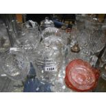 A collection of cut glass including vases, jug, powder bowl, sugar sifter, etc.