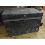 A 27" late Georgian studded leather clad and metal bound travelling trunk with heavy brass