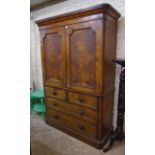 A 4' 9" 19th Century figured mahogany two part linen press with moulded cornice, adapted hanging and