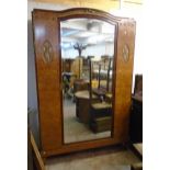 A 4' 11 1/2" French Empire style burr walnut veneered and gilt metal mounted linen cabinet with five