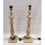 A pair of modern wood baluster pattern table lamps