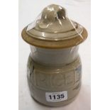 A Truro Studio pottery lidded "Rice" jar with stylised floral decoration