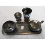 An Arts and Crafts Liberty & Co. Tudric pattern 01641 pewter part condiment set on tray (glass
