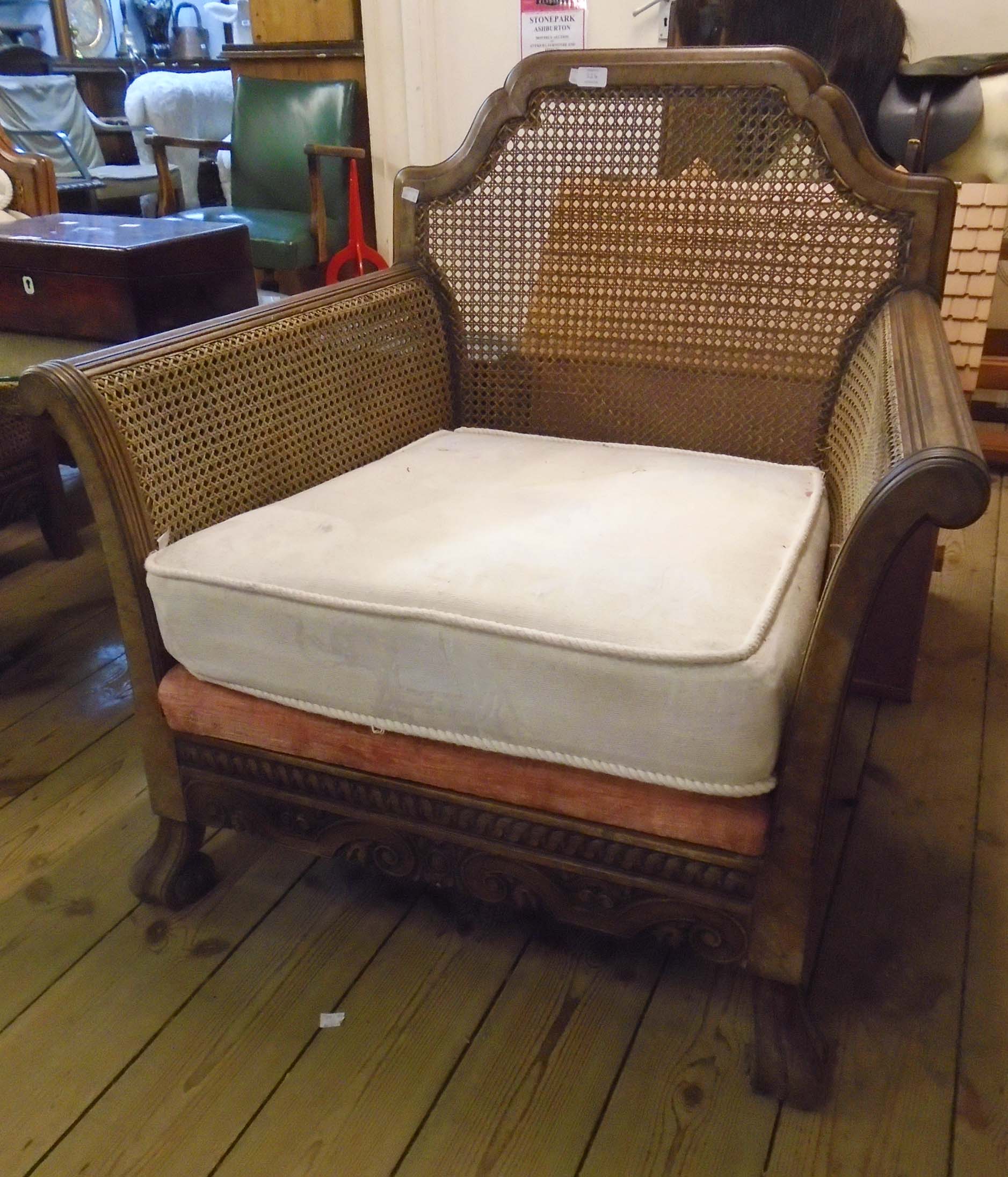 A 1920's walnut framed three piece Bergere suite, comprising 5' 6" three seater settee and pair of - Image 2 of 2