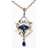 A 9ct. gold chain with Art Nouveau amethyst and seed pearl set open scroll pendant