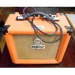 An Orange Crush 10 practise guitar amplifier