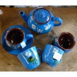 A Torquay Pottery tea for two set