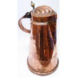 A 16" high copper lidded jug with shell decoration to lid