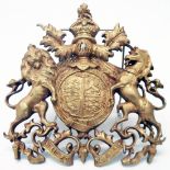 An 8 1/4" gilt brass royal coat of arms of George V