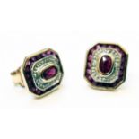 A pair of 9ct. gold Art Deco style canted oblong panel ear-rings, set with rubies and diamonds
