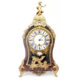 A Louis XIV period ornate boulle and gilt metal salon clock with associated Moreau Laine, Paris dial