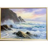 Richard Blowey: a gilt framed oil on canvas depicting breaking waves on a rocky Cornish coast -