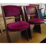 A set of four 1930's stained oak framed dining chairs with studded red velvet upholstered backs