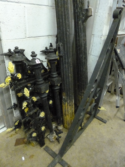 A QUANTITY OF DISMANTLED PAINTED CAST IRON BALLESTRADES, and a wall hanging bracket